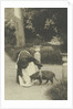 Woman with a dog in a garden by Anonymous