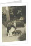 Woman with a dog in a garden by Anonymous