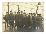 Group portrait of crew on deck of a ship by Anonymous