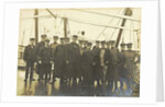 Group portrait of crew on deck of a ship by Anonymous