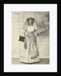 Portrait of a woman in Zaanse costume posing for a background cloth by S. Bakker Jz.