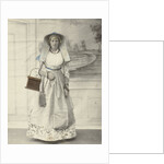 Portrait of a woman in Zaanse costume posing for a background cloth by S. Bakker Jz.