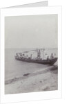 Group men in a boat on the beach in the Dutch East Indies, indonesia by Anonymous