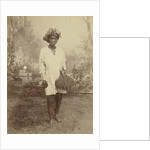 Studio Portrait of woman with paddy in her hand by Anonymous