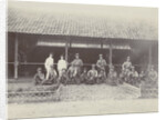 Group portrait of KNIL soldiers with machine guns for a stable by Lik Sun Bros