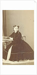 Portrait woman at table with photo album by Alexandre Ken