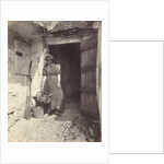 Portrait of a young woman in a doorway by Anonymous