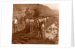 Spanish laborers at work in Culebra Cut and loaded train hauling dirt from canal, USA by Anonymous