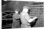Eddystone, Pennsylvania - Railroad parts. Boilermaker and helper working on locomotive boiler, 1936 by Lewis Hine