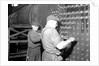 Eddystone, Pennsylvania - Railroad parts. Boilermaker and helper working on locomotive boiler, 1936 by Lewis Hine