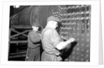 Eddystone, Pennsylvania - Railroad parts. Boilermaker and helper working on locomotive boiler, 1936 by Lewis Hine