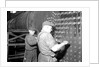 Eddystone, Pennsylvania - Railroad parts. Boilermaker and helper working on locomotive boiler, 1936 by Lewis Hine