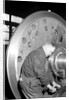 Eddystone, Pennsylvania - Railroad parts. Machinist finishing axle on large driving wheels on newest type of locomotive, March 1937 by Lewis Hine