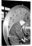 Eddystone, Pennsylvania - Railroad parts. Machinist finishing axle on large driving wheels on newest type of locomotive, March 1937 by Lewis Hine