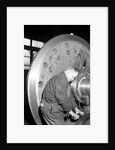 Eddystone, Pennsylvania - Railroad parts. Machinist finishing axle on large driving wheels on newest type of locomotive, March 1937 by Lewis Hine