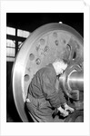Eddystone, Pennsylvania - Railroad parts. Machinist finishing axle on large driving wheels on newest type of locomotive, March 1937 by Lewis Hine
