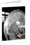 Eddystone, Pennsylvania - Railroad parts. Machinist finishing axle on large driving wheels on newest type of locomotive, March 1937 by Lewis Hine