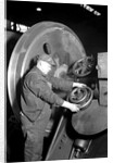 Eddystone, Pennsylvania - Railroad parts. Machinist machining wheel to fit driving pin on above wheels on newest type of locomotive, March 1937 by Lewis Hine