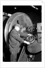 Eddystone, Pennsylvania - Railroad parts. Machinist machining wheel to fit driving pin on above wheels on newest type of locomotive, March 1937 by Lewis Hine