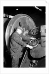Eddystone, Pennsylvania - Railroad parts. Machinist machining wheel to fit driving pin on above wheels on newest type of locomotive, March 1937 by Lewis Hine