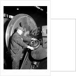 Eddystone, Pennsylvania - Railroad parts. Machinist machining wheel to fit driving pin on above wheels on newest type of locomotive, March 1937 by Lewis Hine