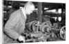 Eddystone, Pennsylvania - Railroad parts. Toolmaker making a taper sleeve gauge from a taper reamer, March 1937 by Lewis Hine