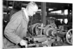 Eddystone, Pennsylvania - Railroad parts. Toolmaker making a taper sleeve gauge from a taper reamer, March 1937 by Lewis Hine