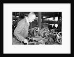 Eddystone, Pennsylvania - Railroad parts. Toolmaker making a taper sleeve gauge from a taper reamer, March 1937 by Lewis Hine
