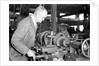 Eddystone, Pennsylvania - Railroad parts. Toolmaker making a taper sleeve gauge from a taper reamer, March 1937 by Lewis Hine