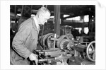Eddystone, Pennsylvania - Railroad parts. Toolmaker making a taper sleeve gauge from a taper reamer, March 1937 by Lewis Hine