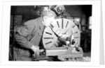 Eddystone, Pennsylvania - Railroad parts. Tool-builder planing for a taper shoe on a steam hammer ram, March 1937 by Lewis Hine