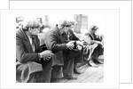Row of men at the New York City docks out of work during the depression, 1934 by Lewis Hine