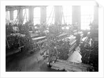 Paterson, New Jersey - Textiles. Idle looms in a cockroach shop. Note the empty beams in the foreground, March 1937 by Lewis Hine