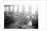 Paterson, New Jersey - Textiles. Idle looms in a cockroach shop. Note the empty beams in the foreground, March 1937 by Lewis Hine