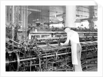 Philadelphia, Pennsylvania - Hosiery. Minnesac Mills. Man working over long row of machines, 1936 by Lewis Hine