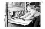 Millville, New Jersey - Glass bottles. Man working at ovens, 1936 by Lewis Hine