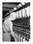 Millville, New Jersey - Textiles. Millville Manufacturing Co. Lady twisting thread, 1936 by Lewis Hine