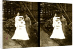 A western Red Cross female doctor(?) and two Japanese women posed in a garden by Anonymous