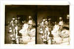 Nurses and a doctor attending wounded soldiers on a hospital ward by Anonymous