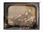 Portrait of two girls reclining on chaise lounge by Sheldon K. Nichols