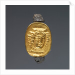 Hollow scarab in swivel ring by Anonymous