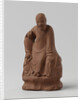 Man figure with raised right leg on rocky pedestal. Red stoneware. by Anonymous