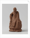 Man figure with raised right leg on rocky pedestal. Red stoneware. by Anonymous