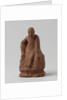 Man figure with raised right leg on rocky pedestal. Red stoneware. by Anonymous