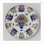 Plate with flower basket by Anonymous