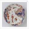 Round dish polychrome painted earthenware with Japanese decor by Anonymous