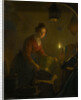A Woman in a Kitchen by Candlelight by Michiel Versteegh