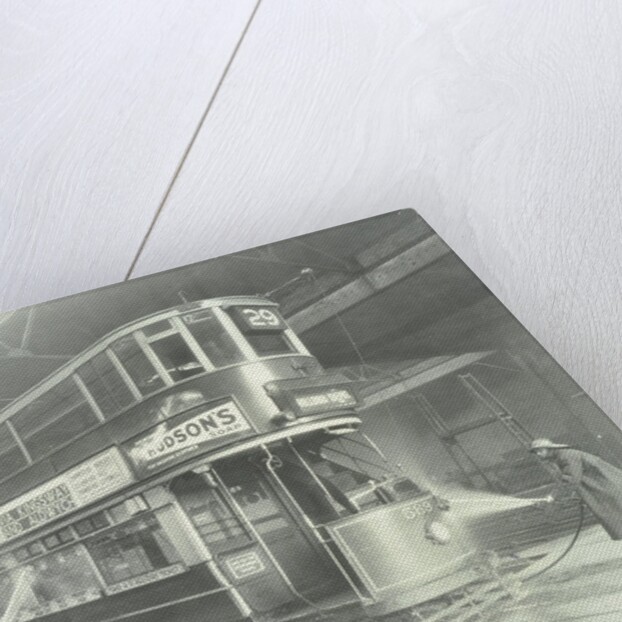 Transport workers washing a tram at the Holloway Car Shed, London, 1932 by Unknown