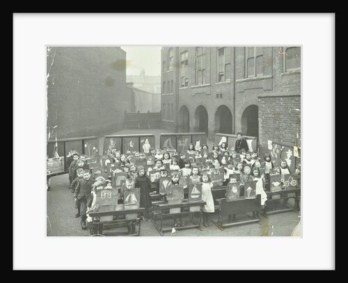 Children displaying their drawings, Flint Street School, Southwark, London, 1908 by Unknown