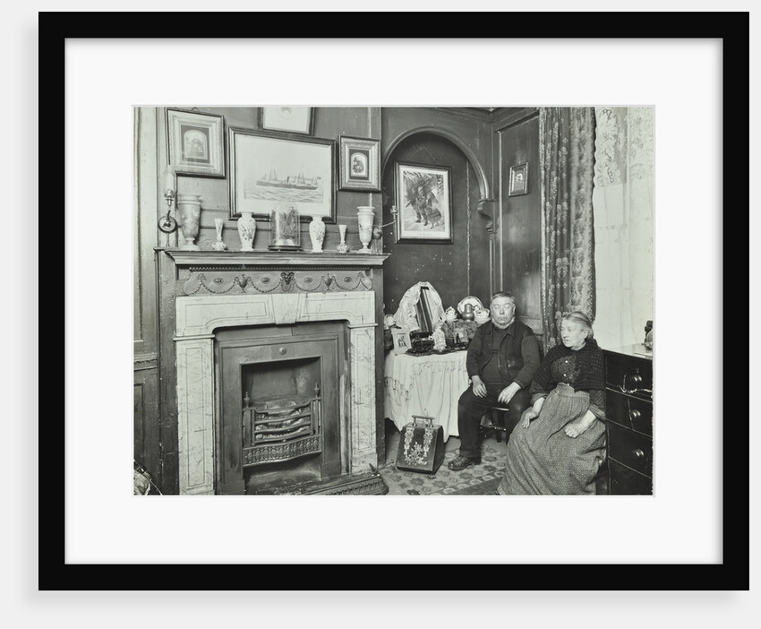 Elderly couple in Victorian interior, Albury Street, Deptford, London, 1911 by Unknown